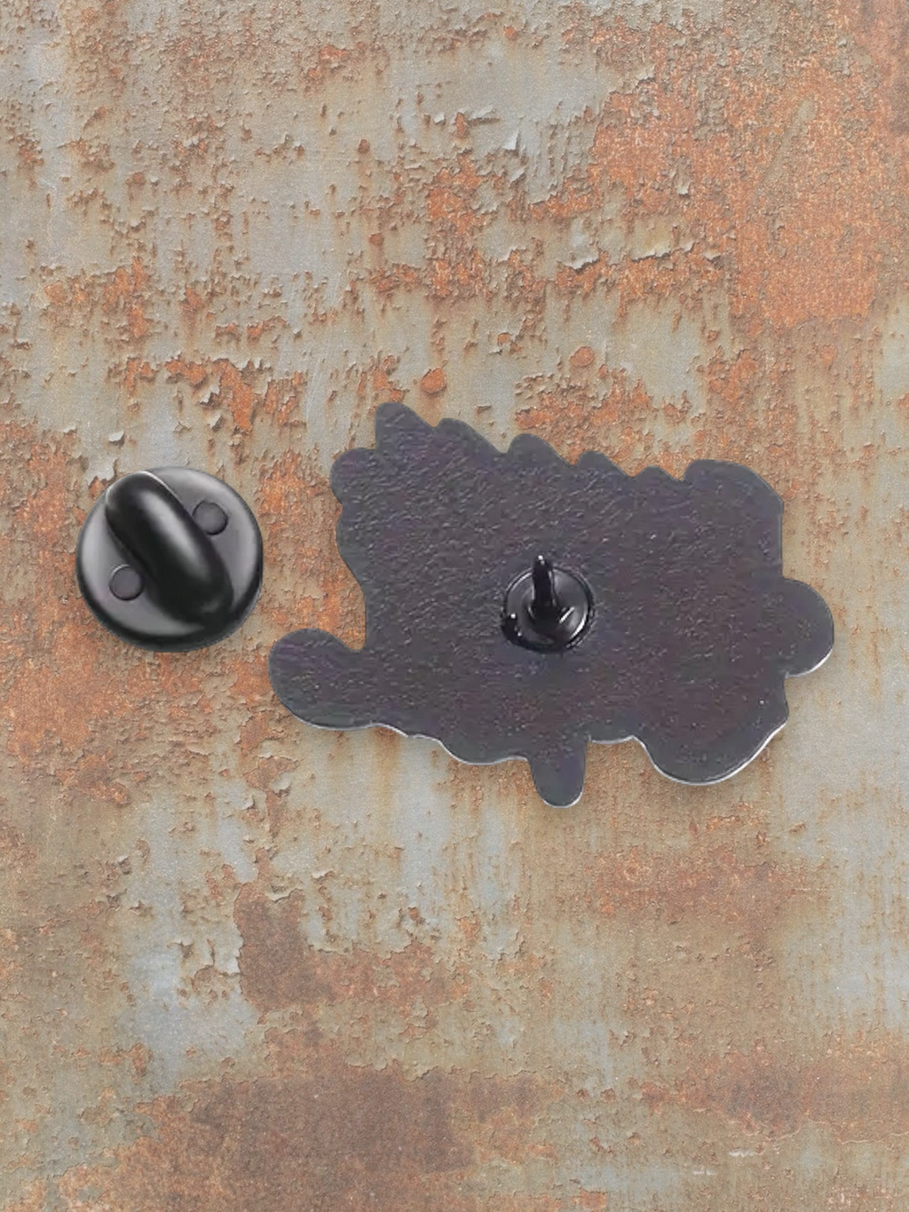 WILDSIDE black enamel pin with a jagged edge design, featuring a metal clutch backing.