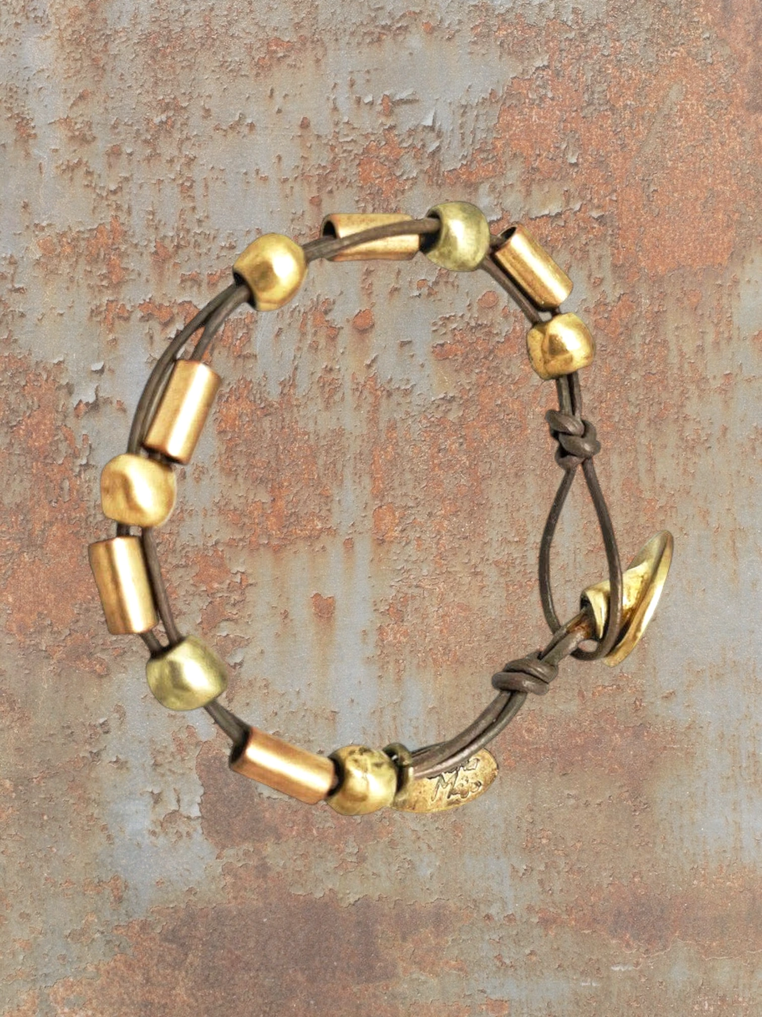 WILDSIDE brown leather bracelet with gold-tone beads and a gold clasp. Handmade in Spain.