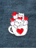 WILDSIDE cute white cat pin in a teacup with red and pink hearts, enamel design.