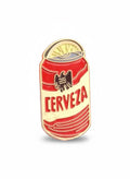 WILDSIDE red and gold enamel pin shaped like a beer can with a slice of lime on top. Features the word CERVEZA.