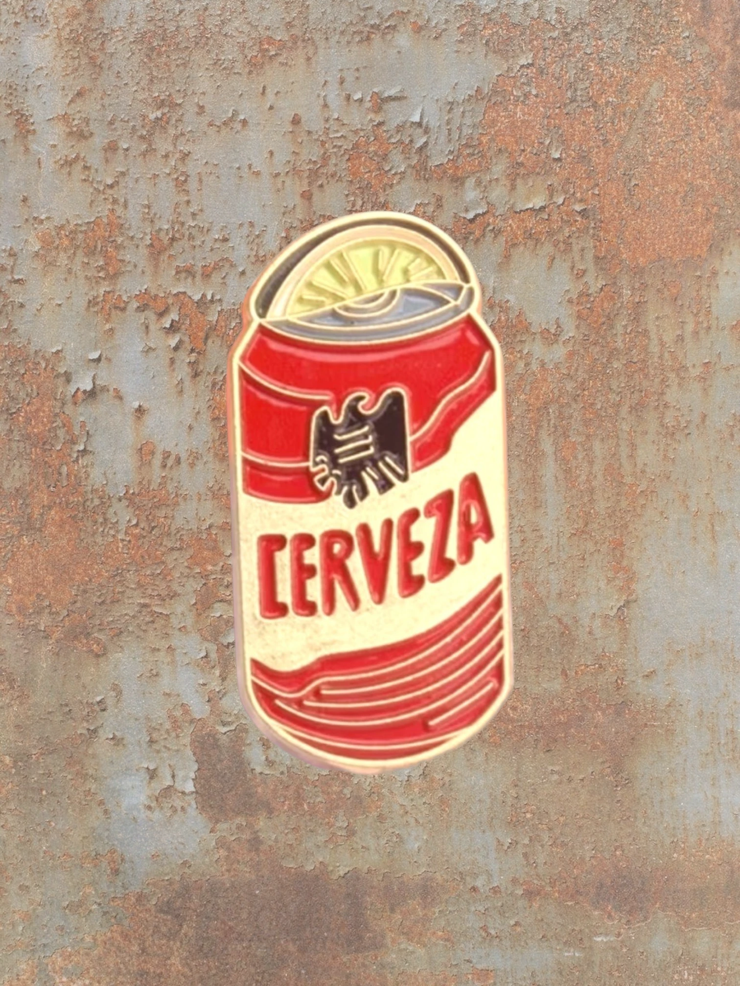 WILDSIDE red and cream cerveza can enamel pin with eagle emblem and yellow top.