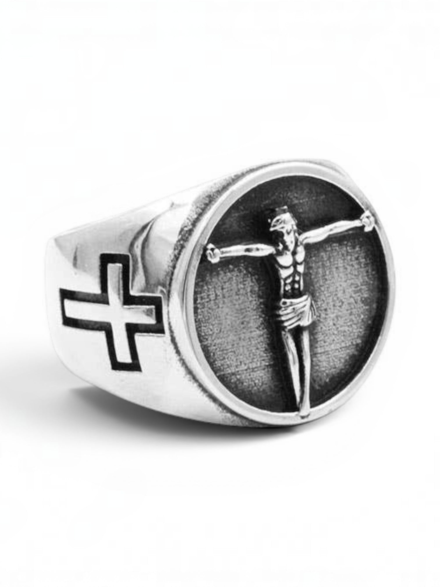 WILDSIDE silver-tone signet ring featuring a detailed crucifix centerpiece and cross motifs on a textured band.