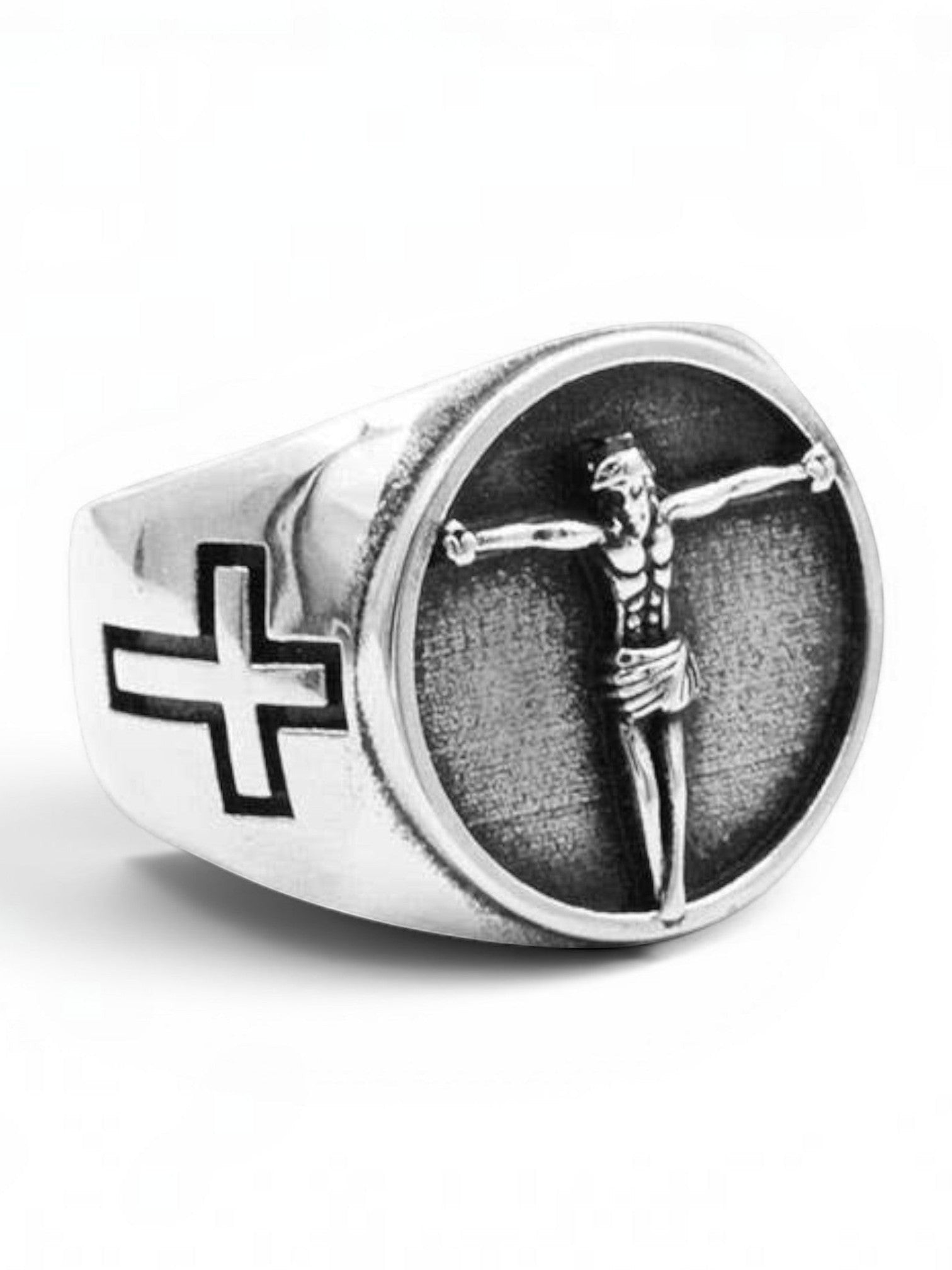 WILDSIDE silver-tone signet ring featuring a detailed crucifix centerpiece and cross motifs on a textured band.