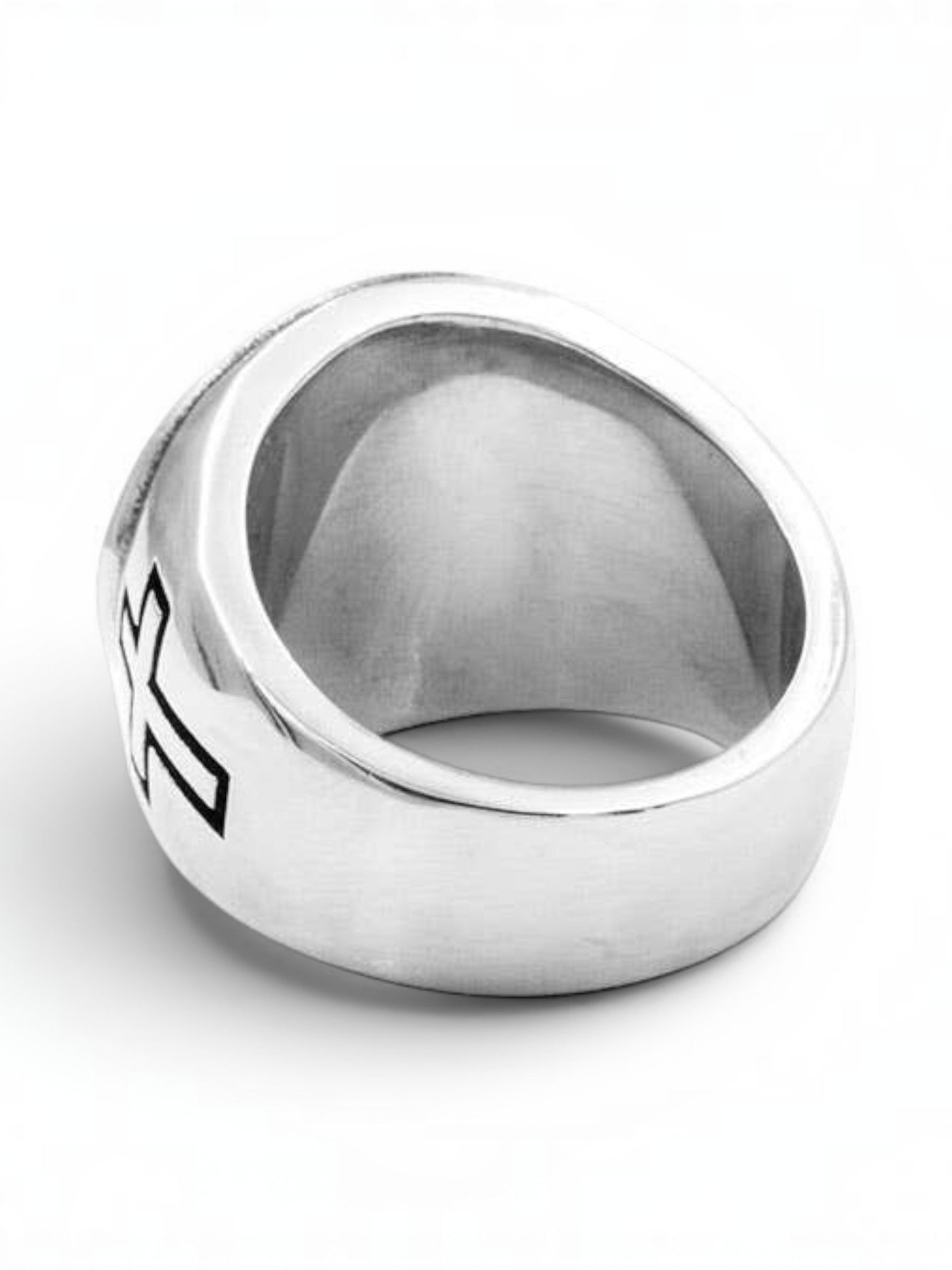 WILDSIDE silver-tone signet ring featuring a detailed crucifix centerpiece and cross motifs on the band.
