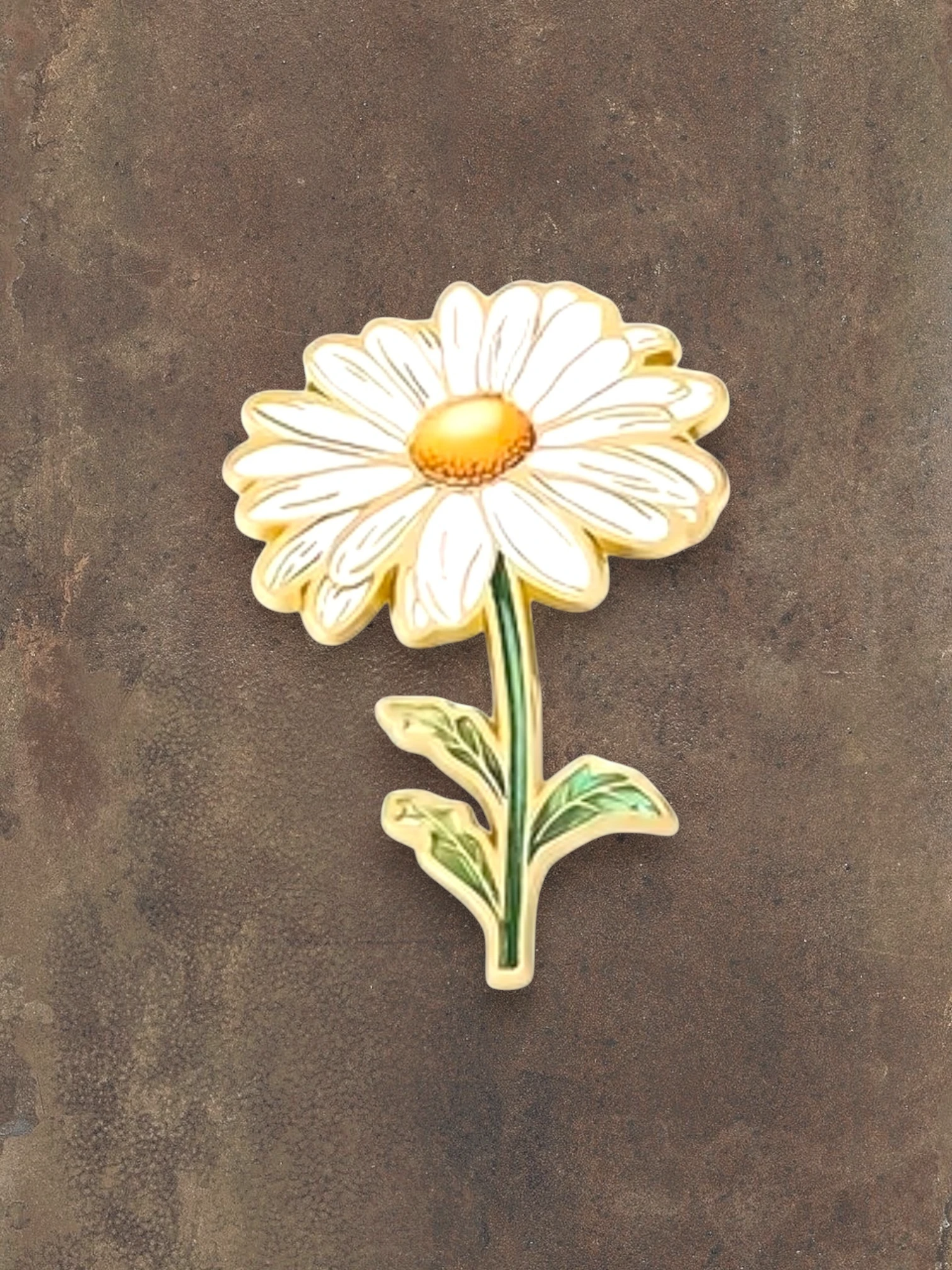 WILDSIDE daisy flower pin with white petals, yellow center, and green stem and leaves.