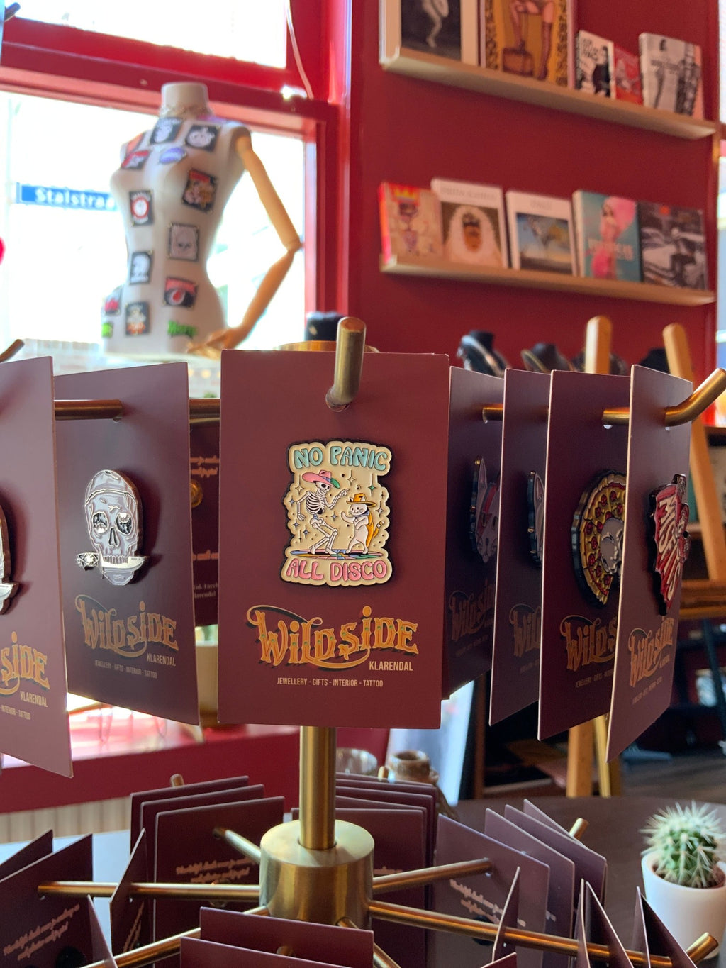 WILDSIDE No Panic All Disco enamel pin featuring a skeleton and cat dancing in cowboy hats.