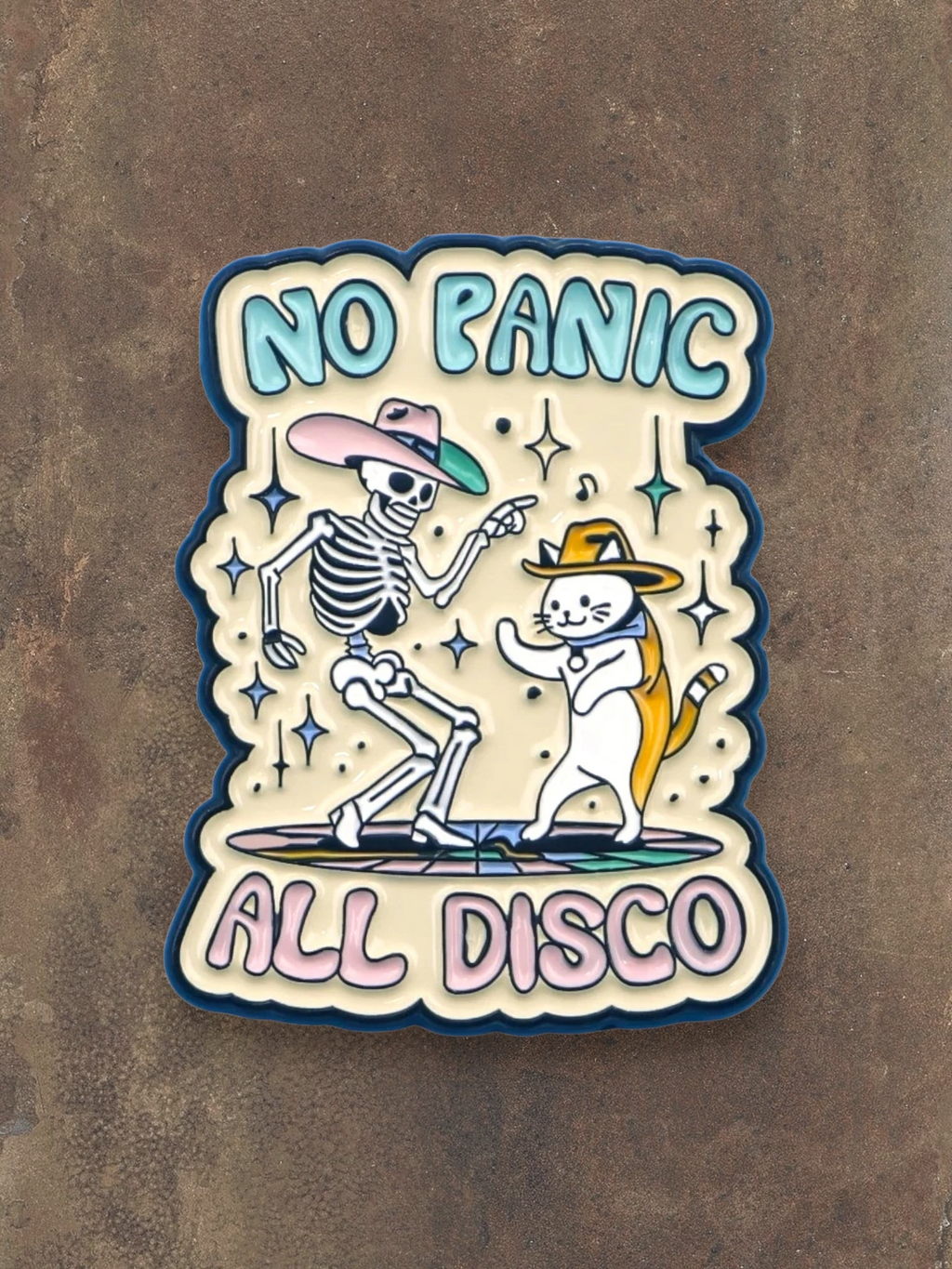 WILDSIDE No Panic All Disco enamel pin featuring a skeleton and cat dancing in cowboy hats.