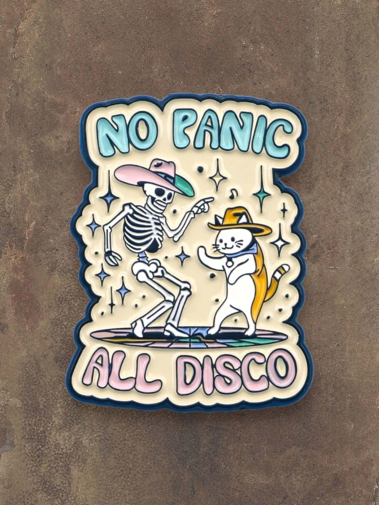 WILDSIDE No Panic All Disco enamel pin featuring a skeleton and cat dancing in cowboy hats.