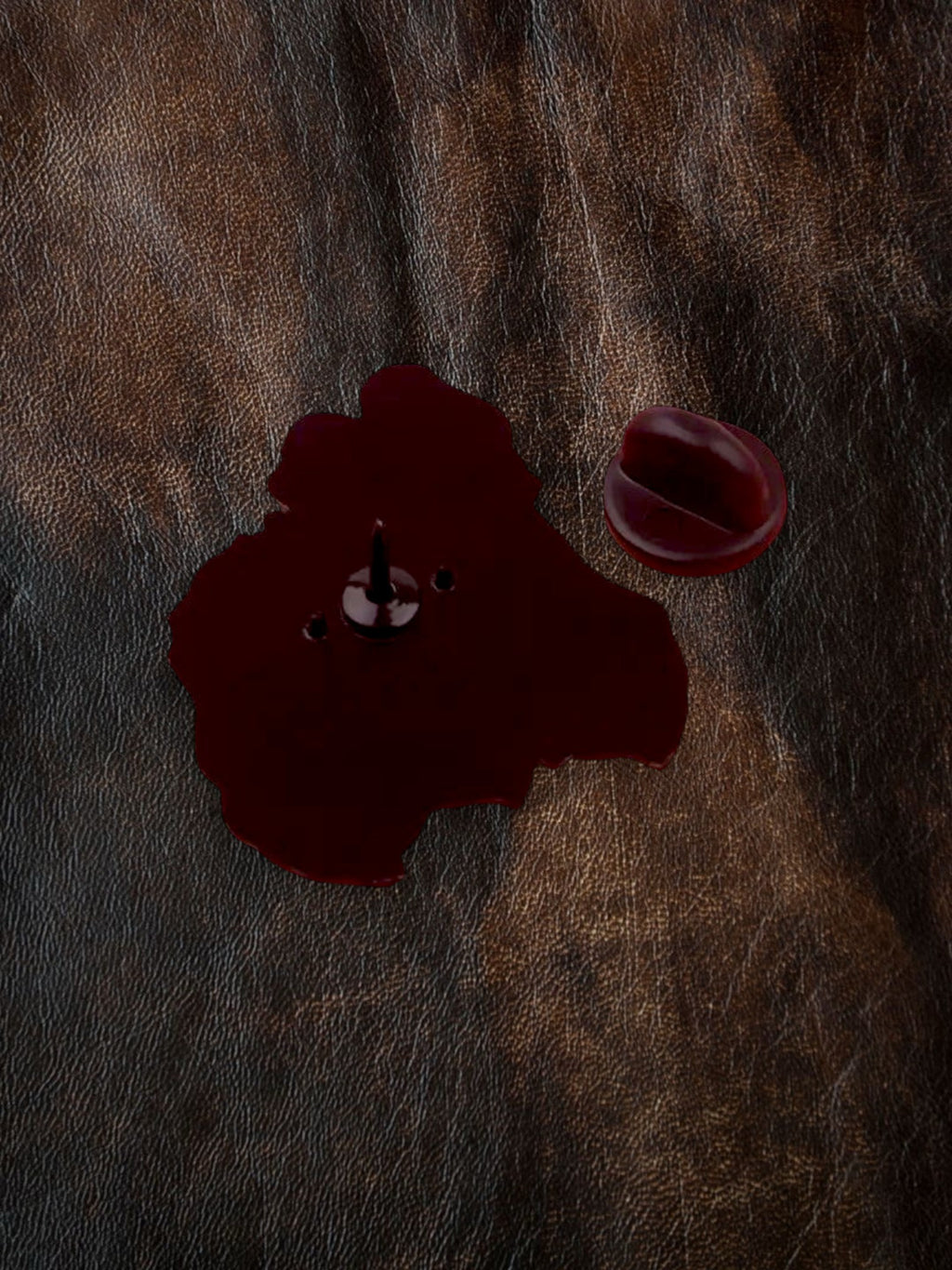WILDSIDE dark red enamel dog pin with clutch back, shaped like a dog's head.
