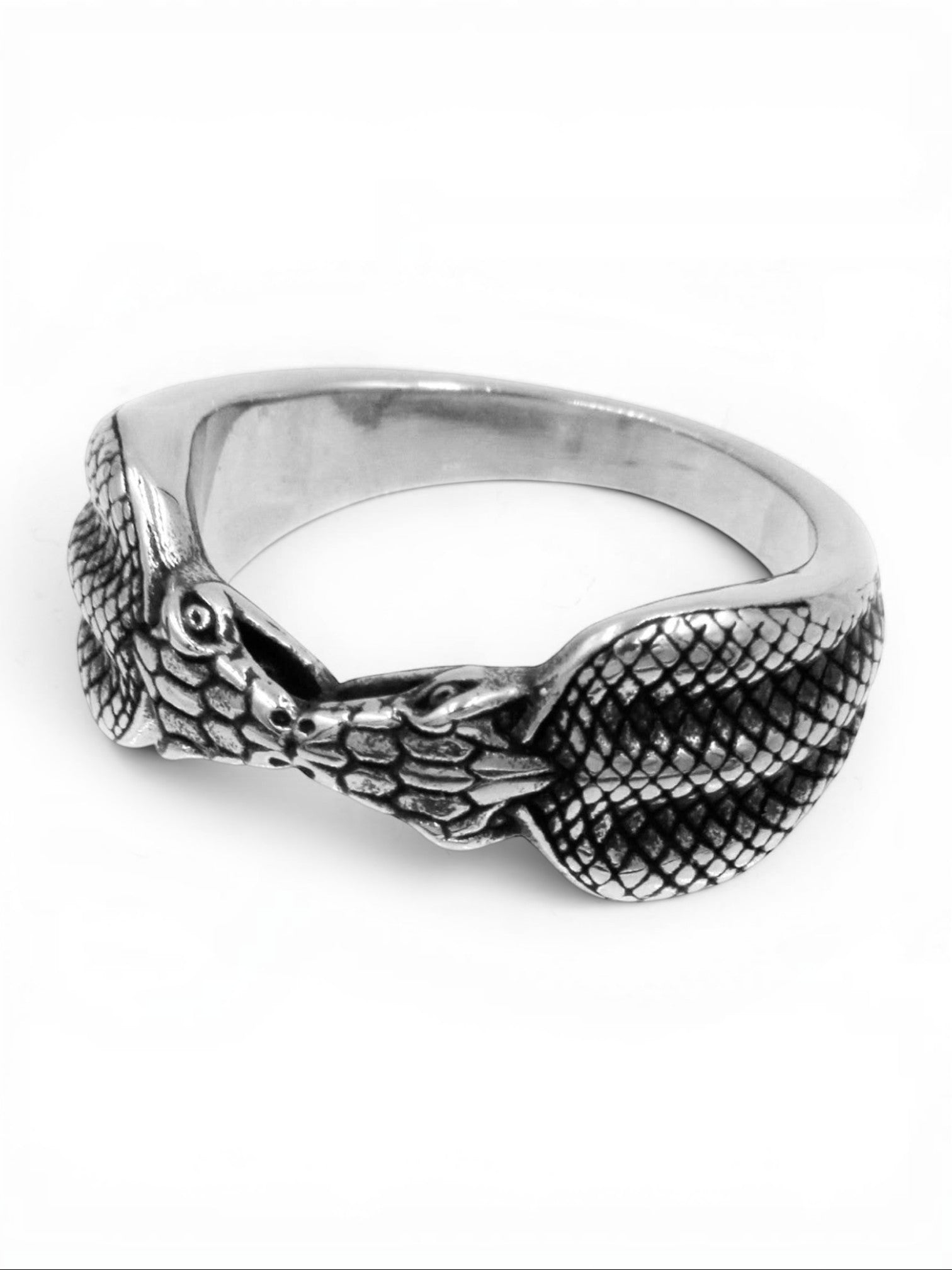 WILDSIDE double cobra ring in polished 316L surgical stainless steel with detailed snake scale texture.