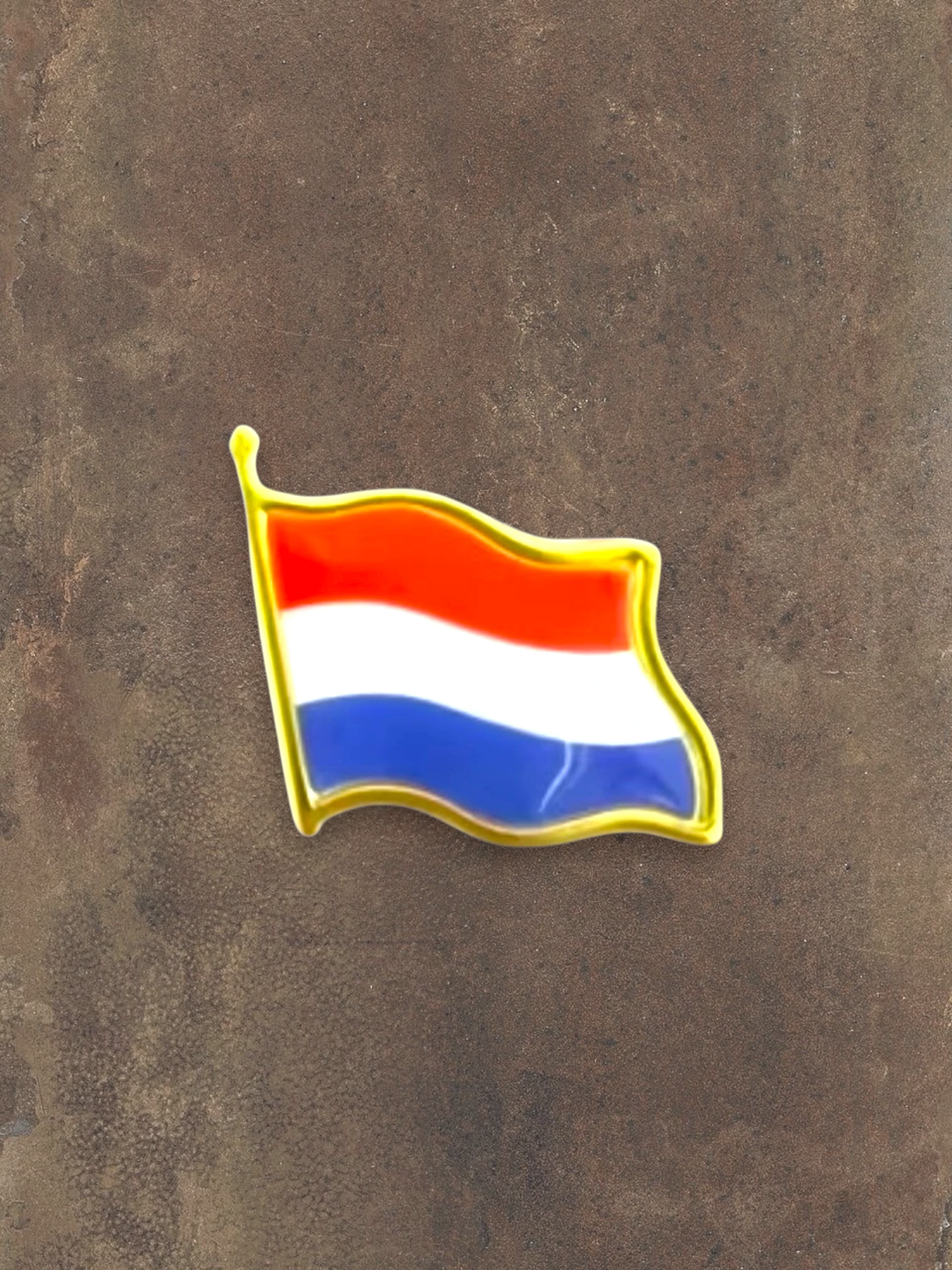 WILDSIDE Dutch flag pin with red, white, and blue stripes and a gold border. Proud Dutch