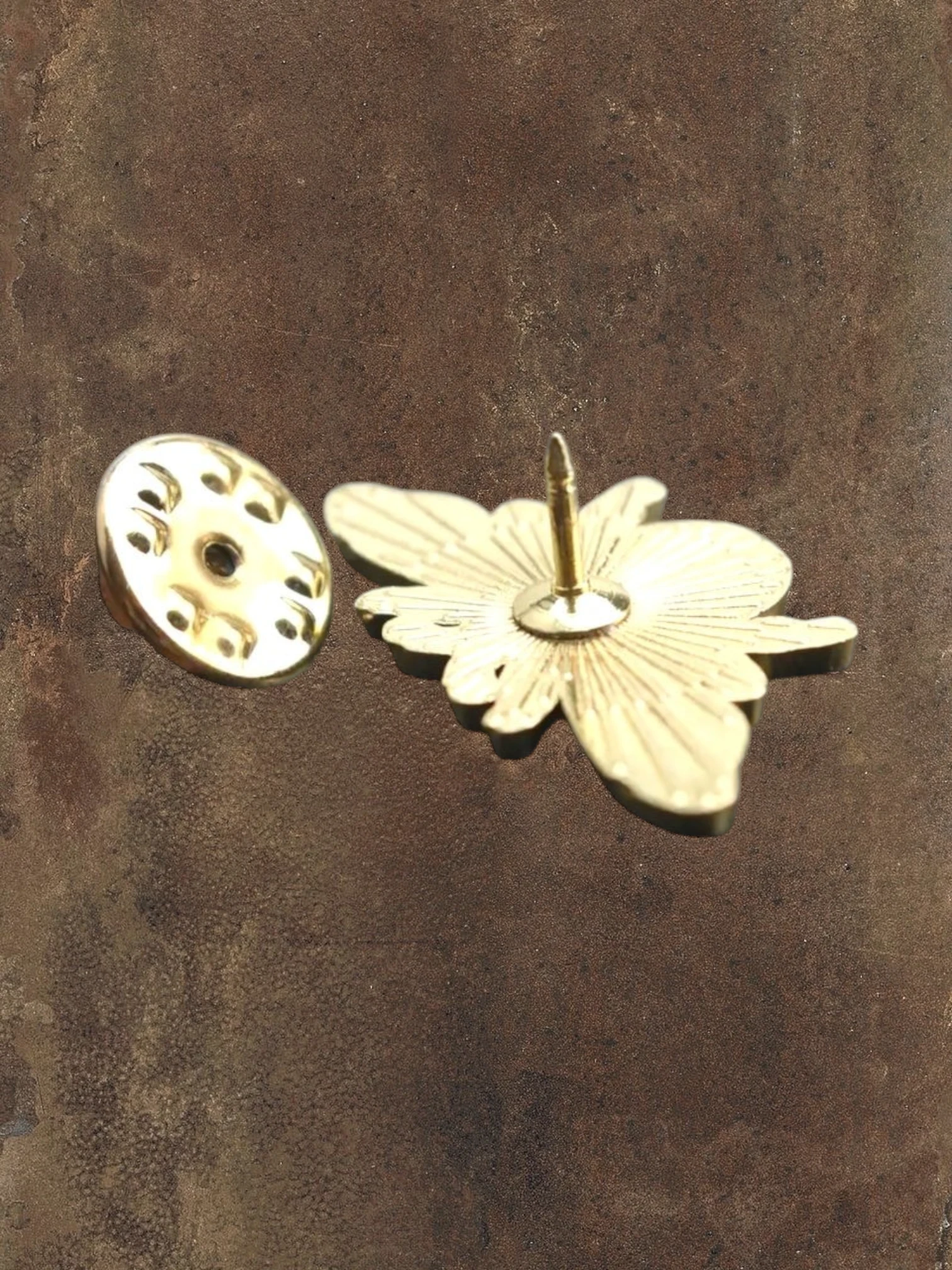 WILDSIDE gold-tone enamel bee lapel pin with black and yellow stripes and white wings, featuring a classic pin backing.