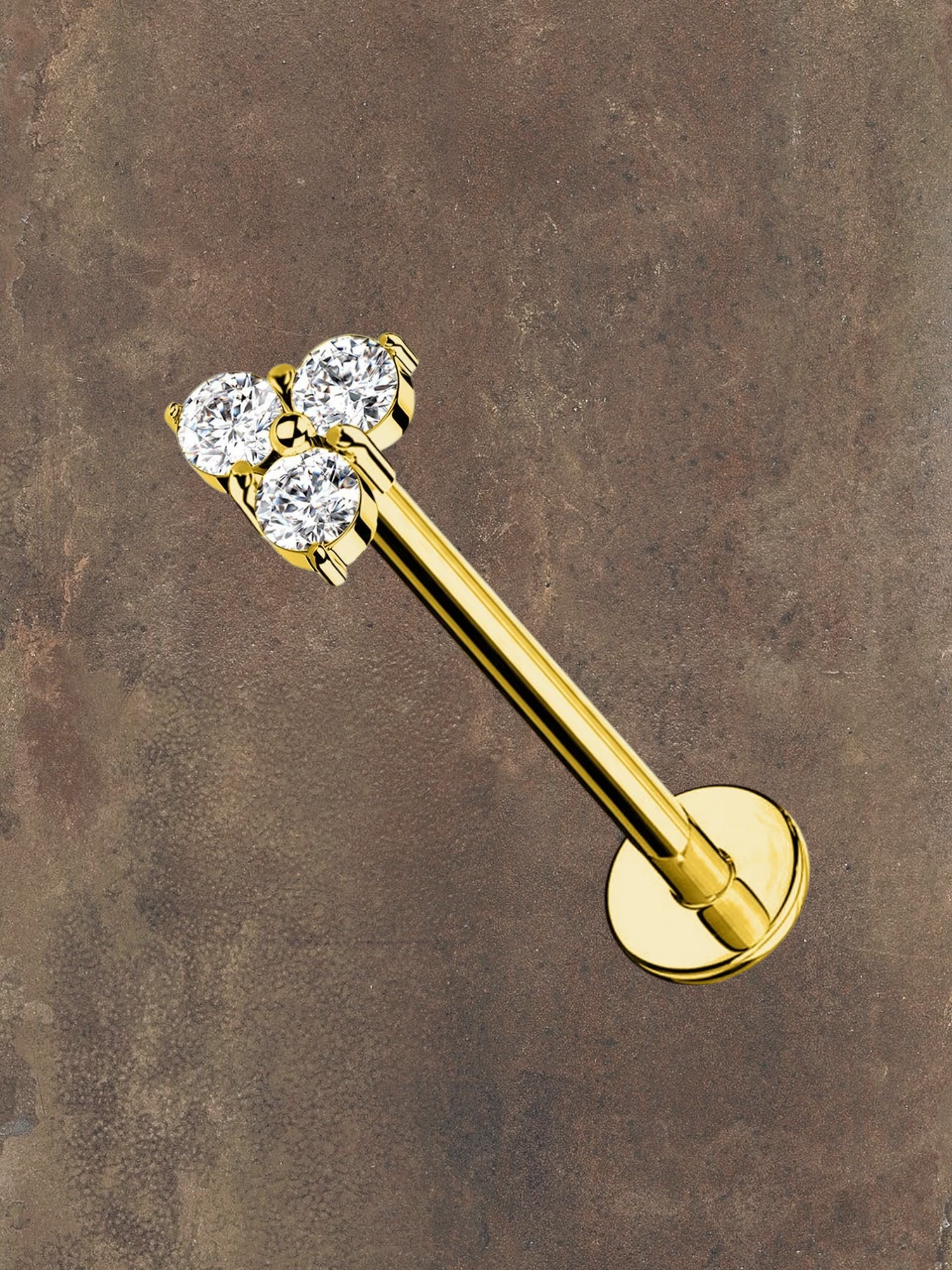WILDSIDE gold-tone 316L surgical steel flat labret piercing with three clear crystals and internal threading.