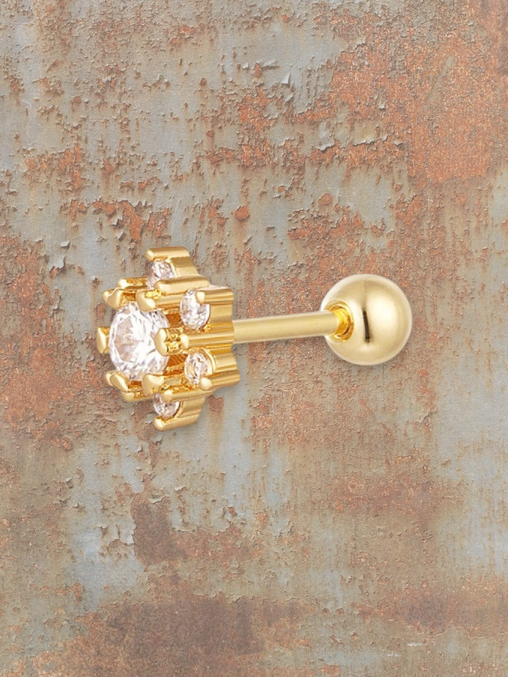 WILDSIDE gold-tone stud piercing with clear cubic zirconia stones in a floral design.