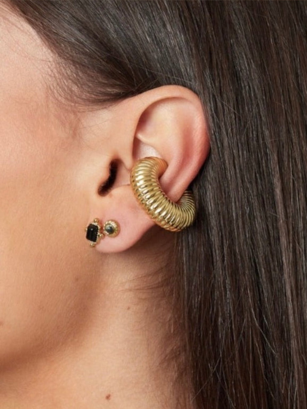 WILDSIDE gold ribbed ear cuff, no piercing needed. Statement jewelry for any occasion.