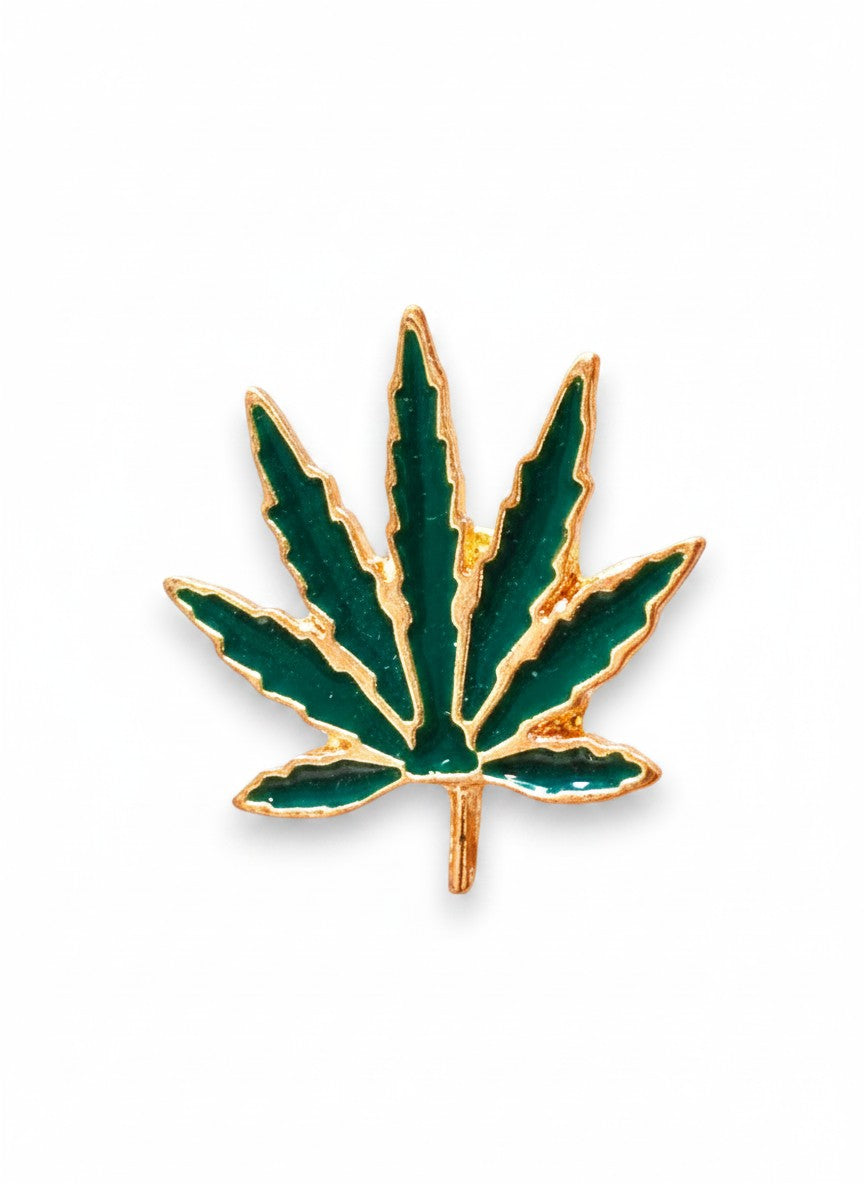 WILDSIDE green enamel marijuana leaf pin with gold trim. Perfect for jackets and bags.
