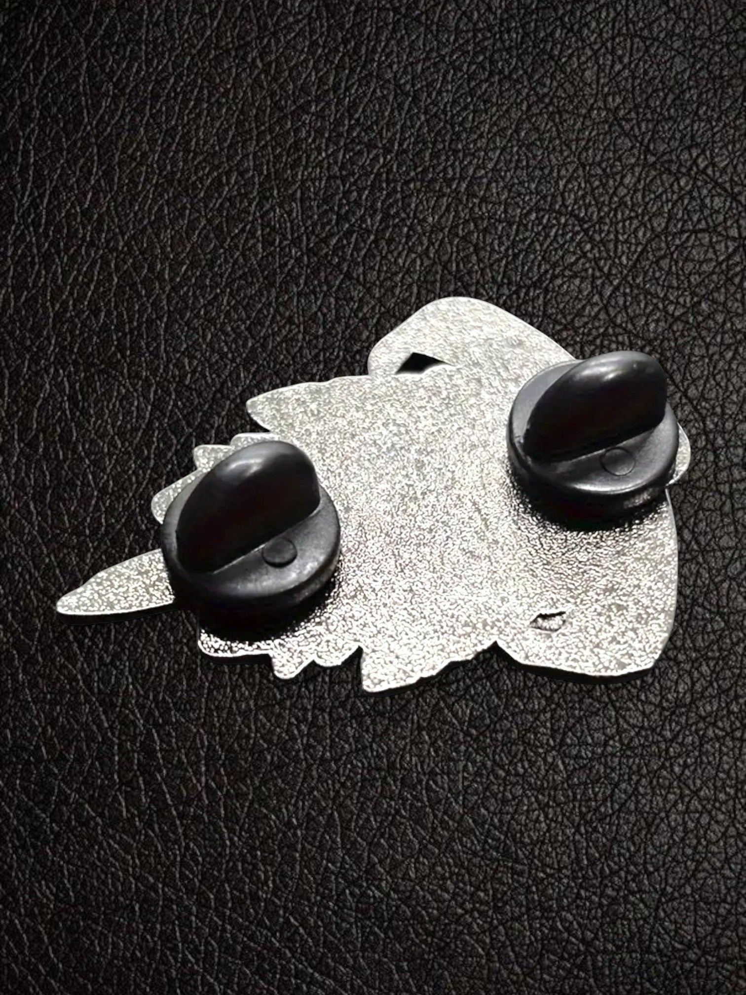 WILDSIDE Guns N Roses enamel pin with silver metal backing and two black clutch fasteners.