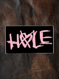 WILDSIDE black rectangular pin with pink 'Hole' text and a heart symbol.