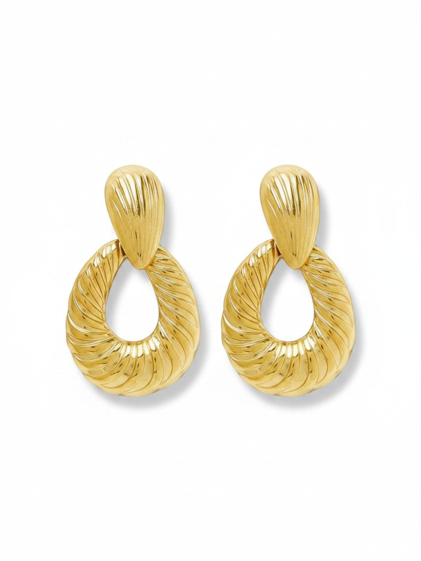 WILDSIDE Moode gold-toned statement earrings with a textured, ribbed teardrop design for a modern look.