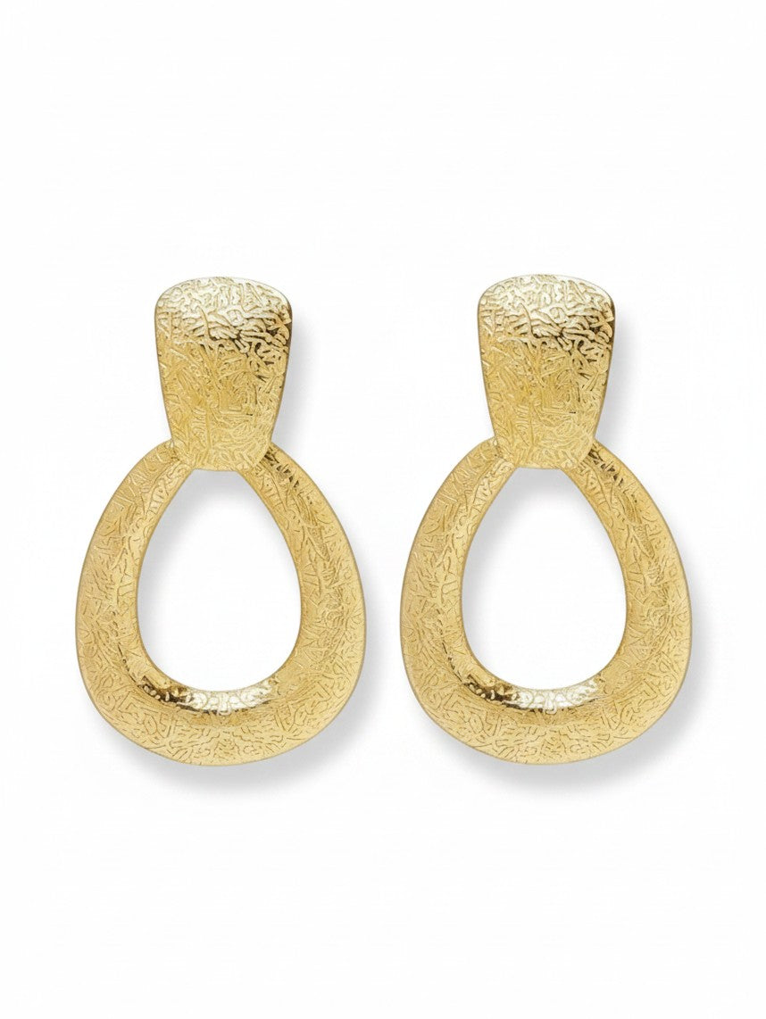 WILDSIDE Moode gold-tone statement earrings with a textured teardrop design on a white background