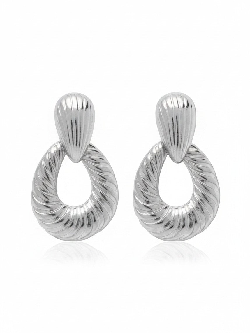 WILDSIDE Moode statement earrings in silver with a textured ribbed teardrop design for a modern look.