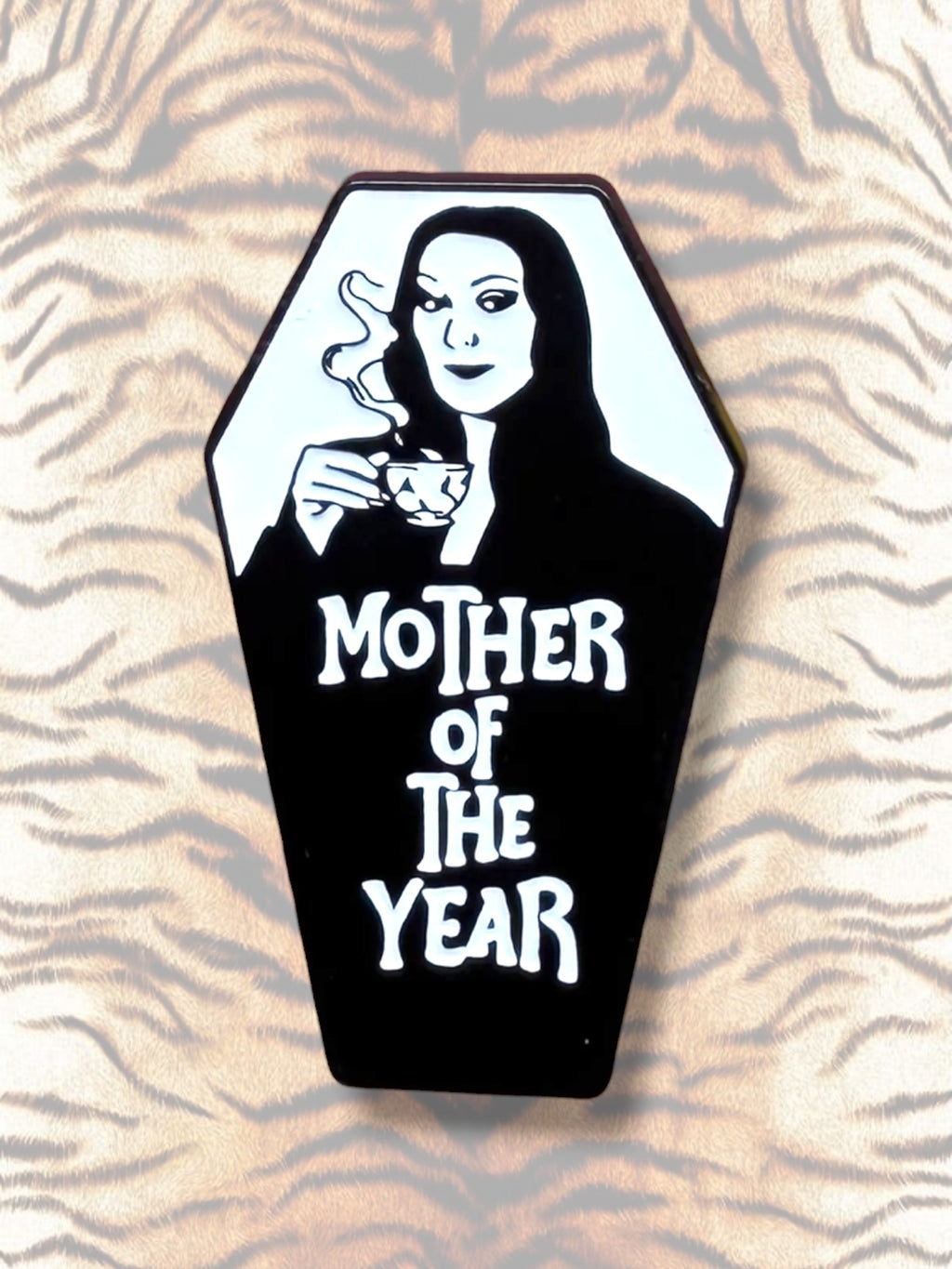 WILDSIDE Morticia Addams coffin pin with "Mother of the Year" text and smoking teacup.