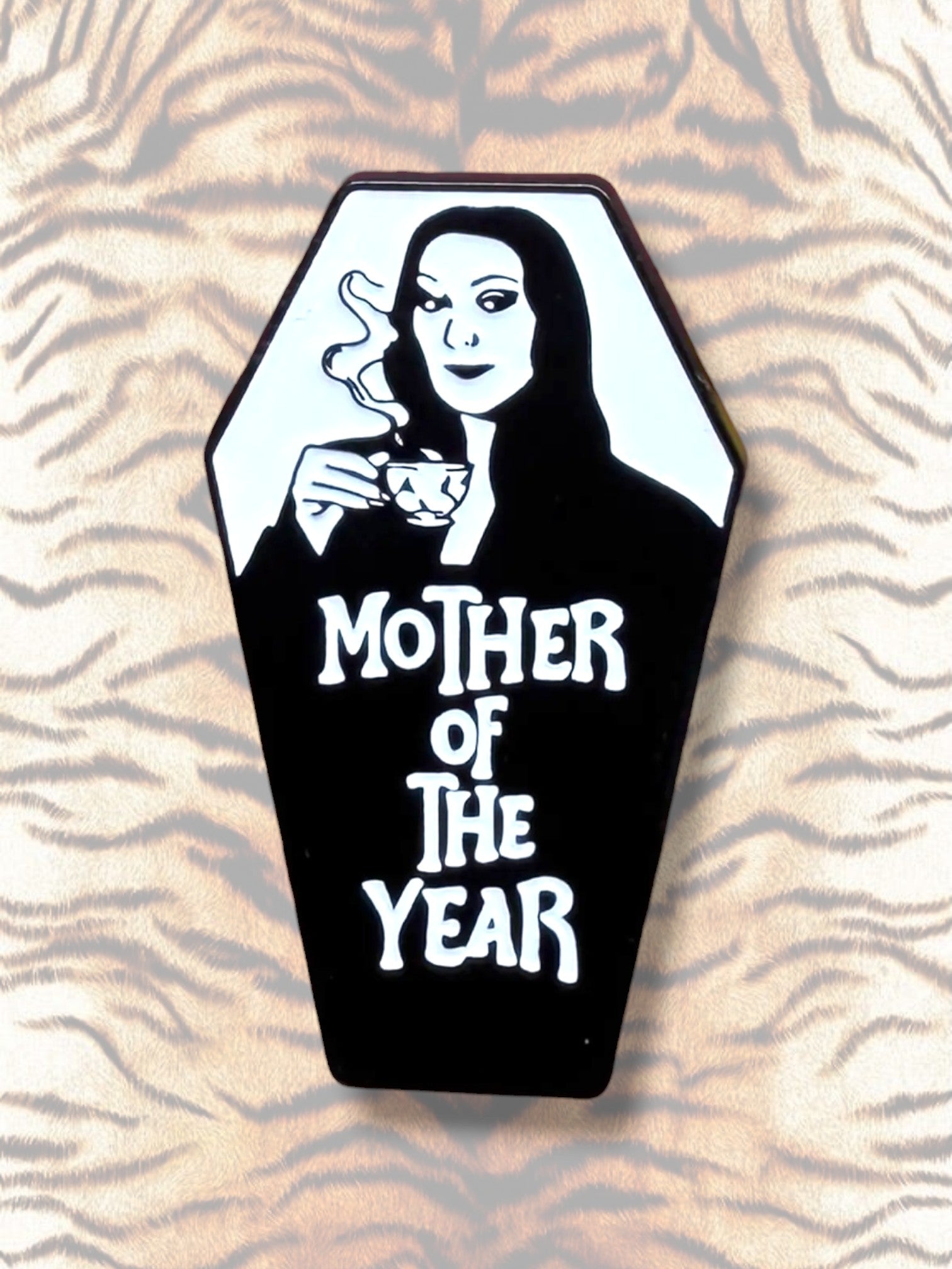 WILDSIDE Morticia Addams coffin pin with "Mother of the Year" text and smoking teacup.