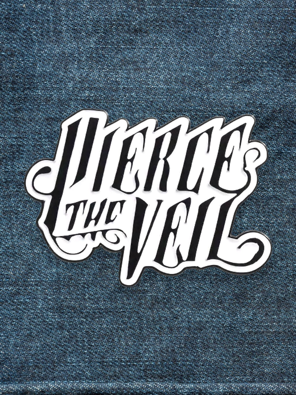 WILDSIDE Pierce the Veil band logo pin with white lettering on a black outline, displayed on denim.