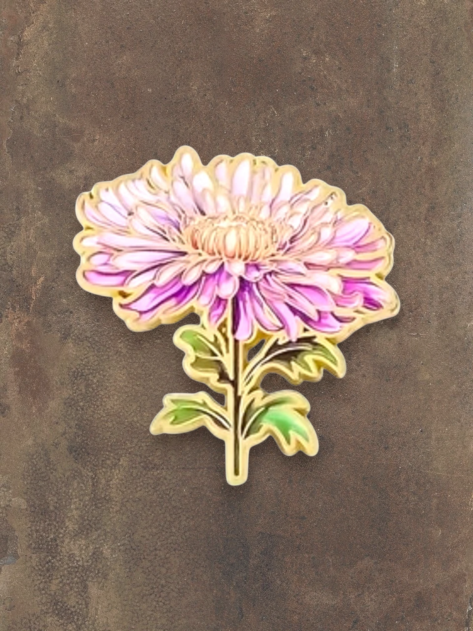 WILDSIDE pink and purple chrysanthemum flower pin with gold trim and green leaves.