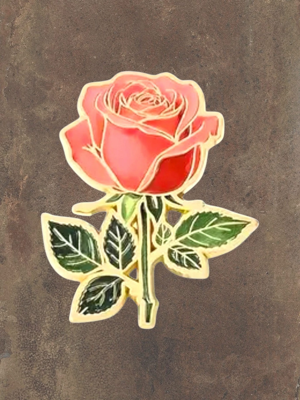 WILDSIDE pink rose flower enamel pin with green leaves and gold trim. Perfect accessory for jackets and bags.