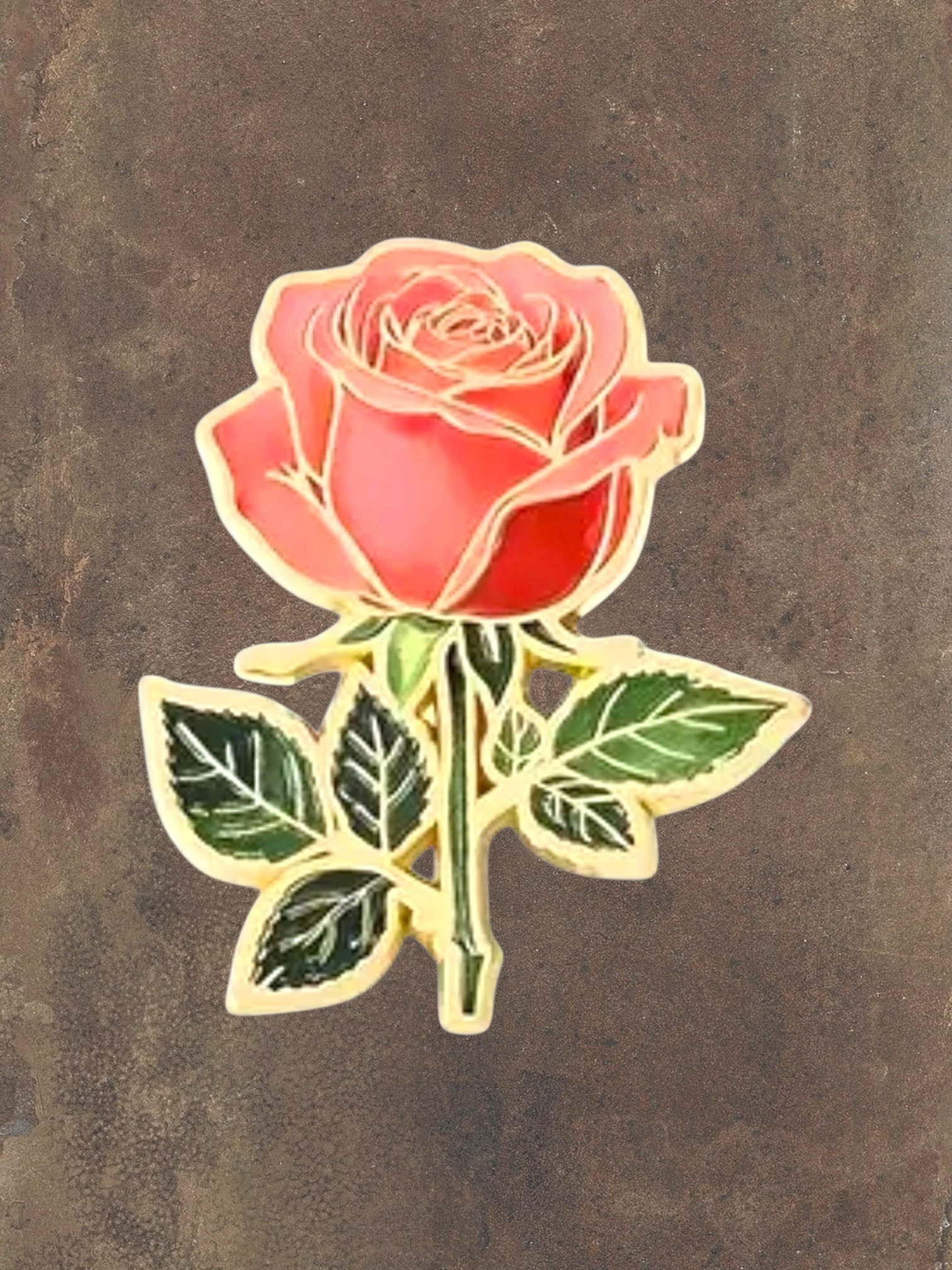 WILDSIDE pink rose flower enamel pin with green leaves and gold trim. Perfect accessory for jackets and bags.