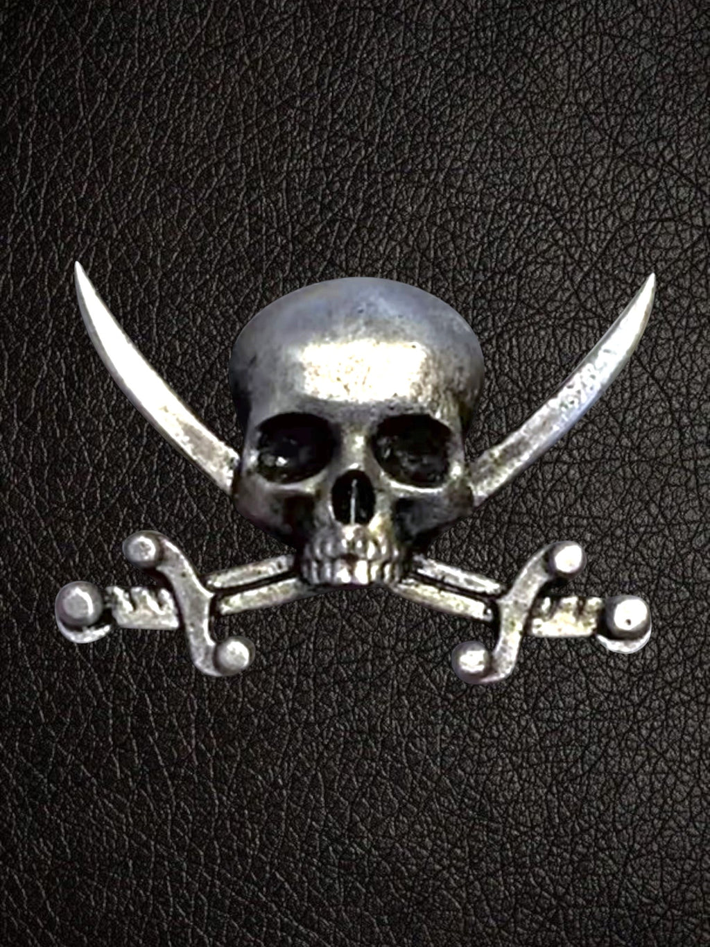 WILDSIDE pirate skull and crossbones pin, silver-tone metal with detailed skull and crossed swords.