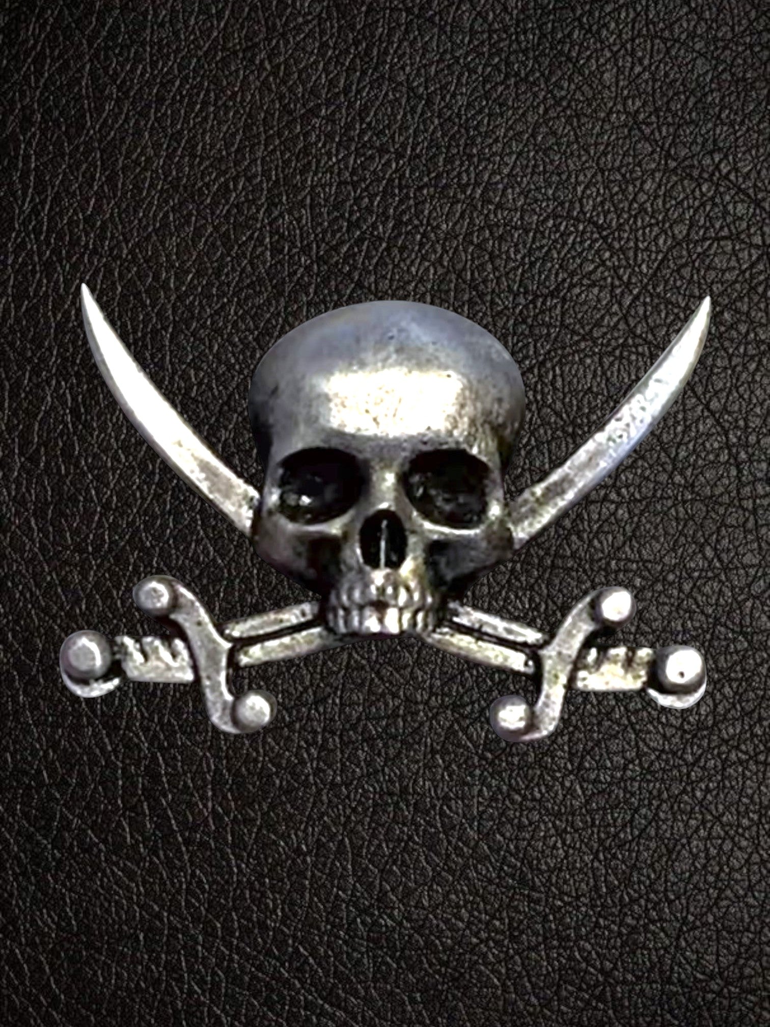 WILDSIDE pirate skull and crossbones pin, silver-tone metal with detailed skull and crossed swords.