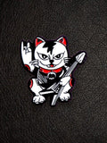 WILDSIDE punk cat pin with guitar and rock on hand gesture, black, white, and red enamel.
