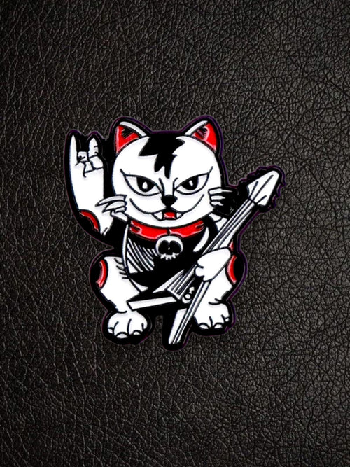 WILDSIDE punk cat pin with guitar and rock on hand gesture, black, white, and red enamel.