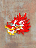 WILDSIDE red and yellow enamel dragon head pin with gold trim. Features intricate details and a fierce expression.