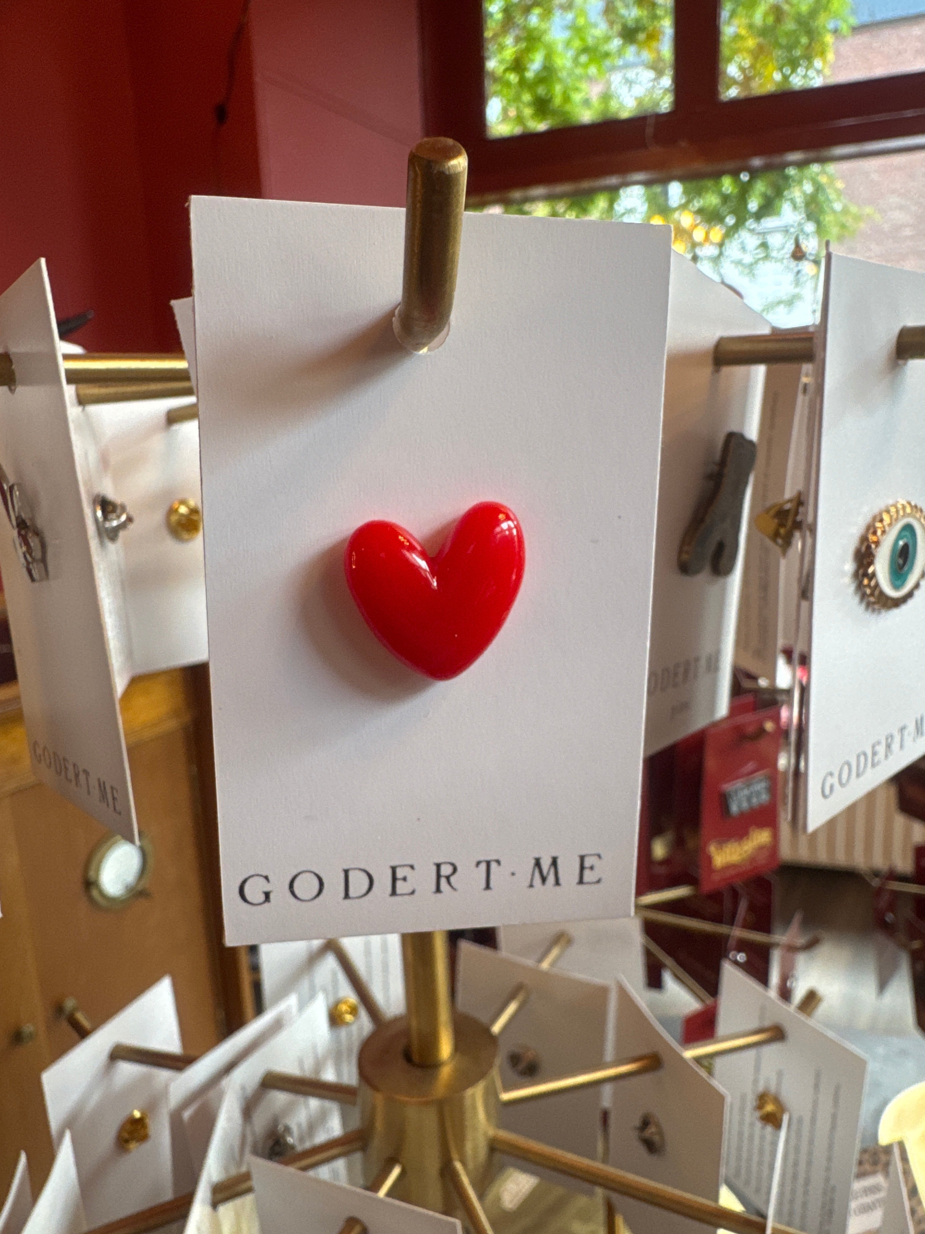 WILDSIDE red heart-shaped enamel pin, perfect for adding a personal touch to jackets and bags.