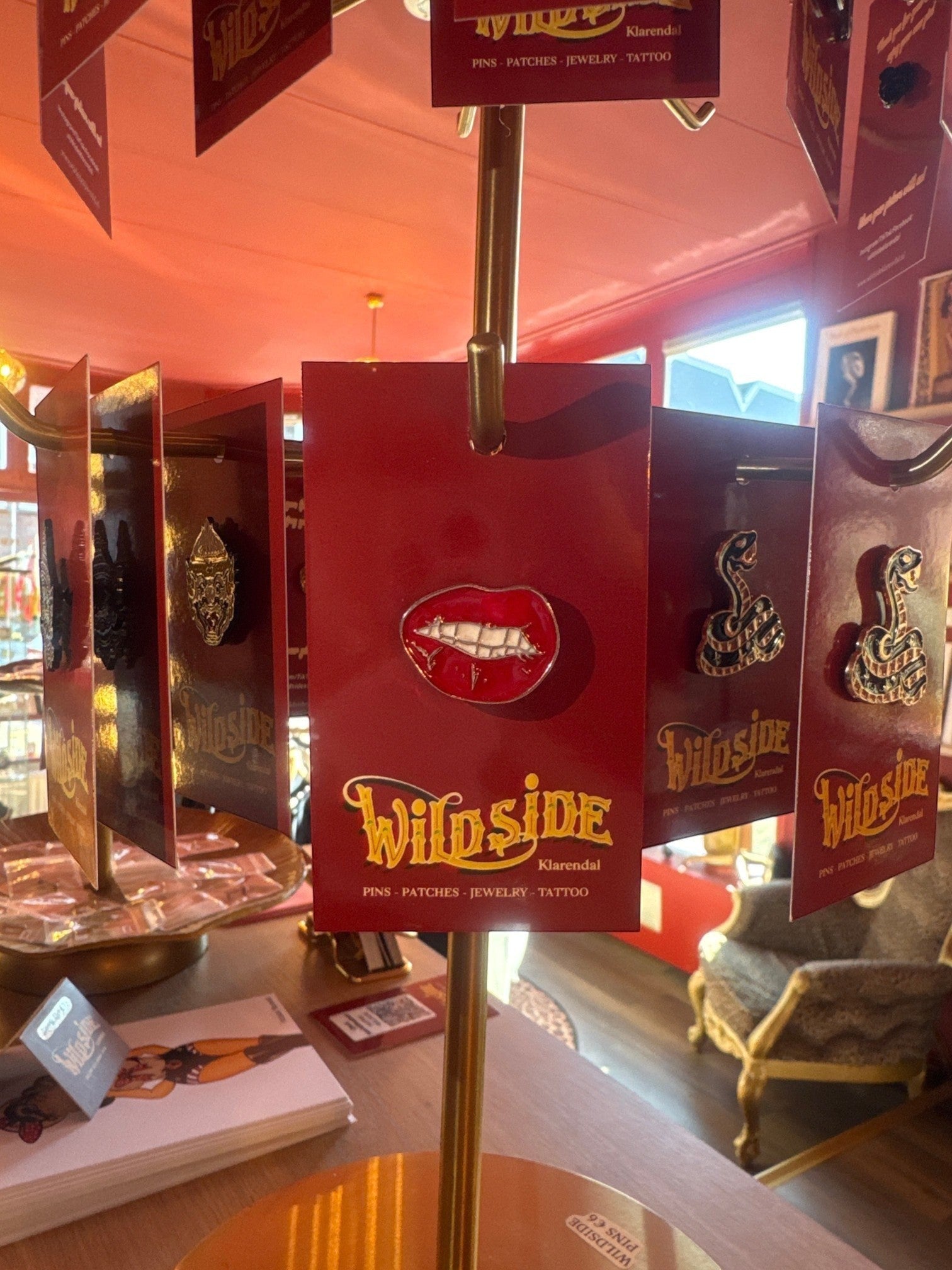 WILDSIDE red enamel lips pin with white teeth and silver detailing. Perfect for jackets and bags.