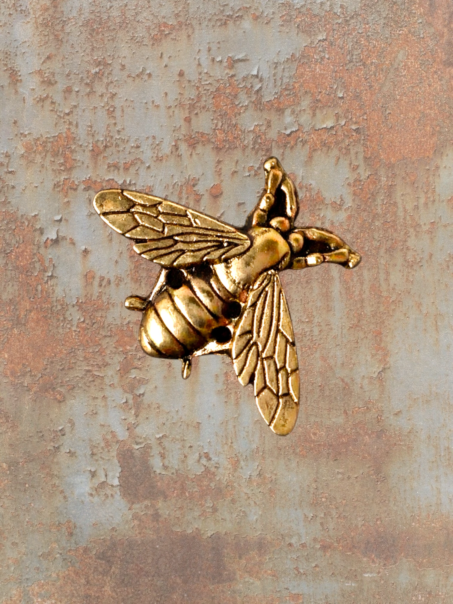 WILDSIDE rose gold bee pin with detailed wings and body, perfect for jackets.