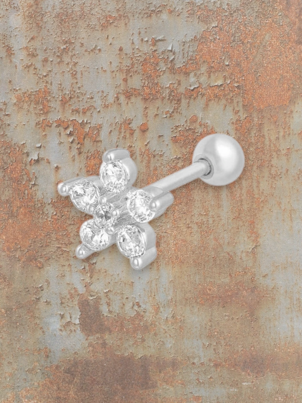 WILDSIDE silver flower piercing with clear sparkling stones. Elegant and durable.