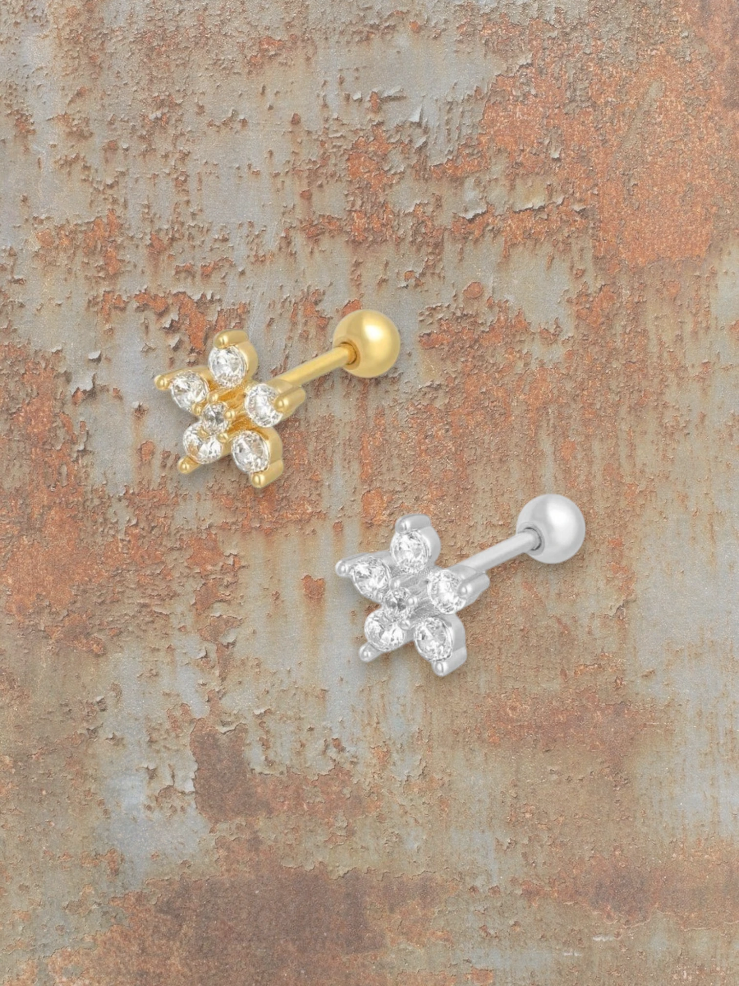 WILDSIDE silver flower piercing with clear stones. Gold and silver options available.