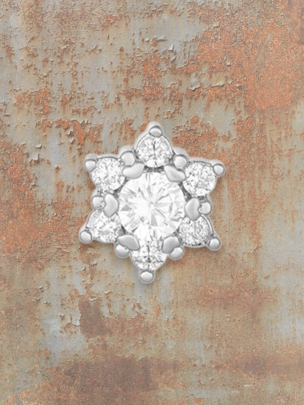 WILDSIDE silver piercing with clear stones in a floral design. Elegant and sparkly.
