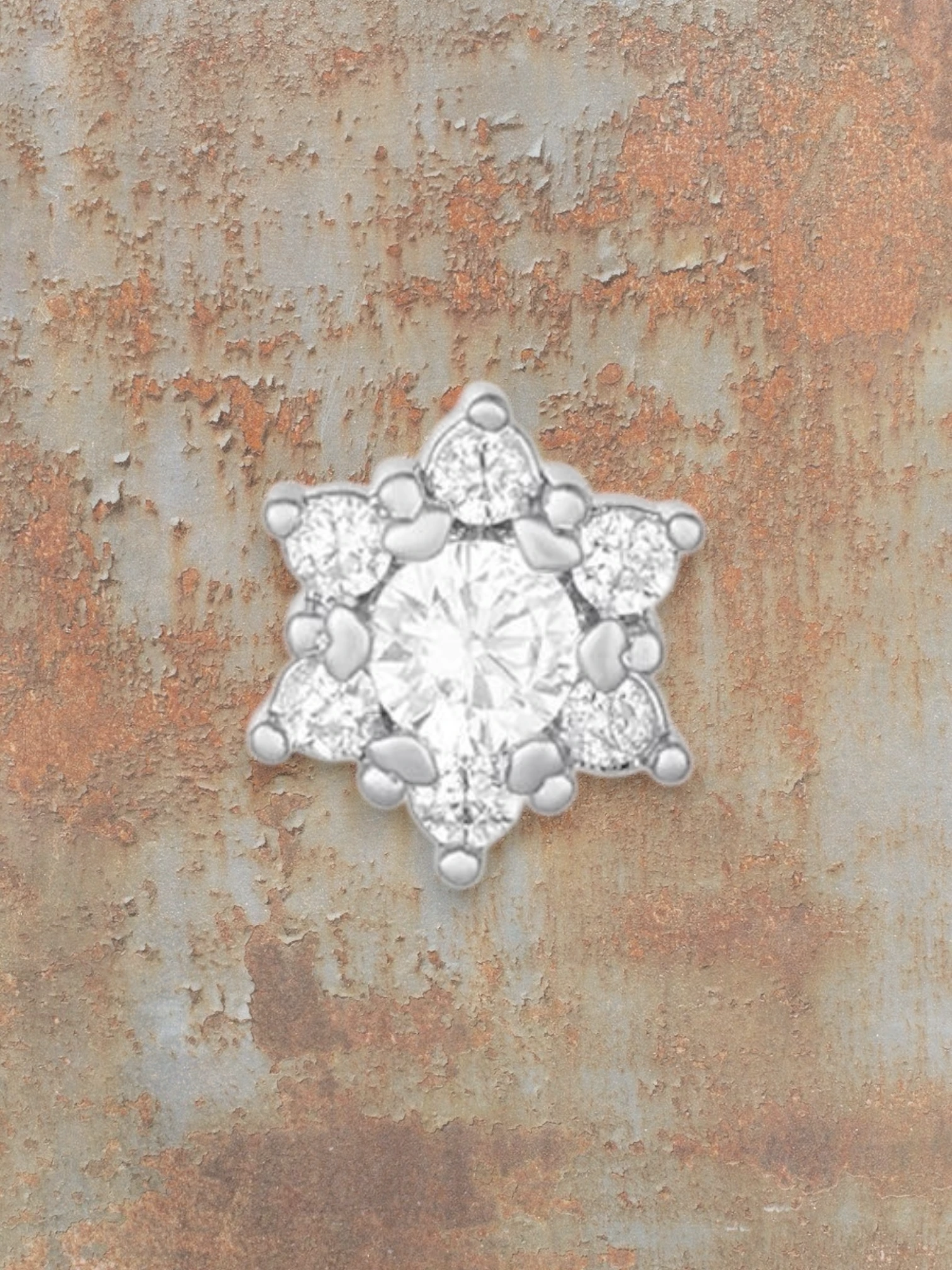 WILDSIDE silver piercing with clear stones in a floral design. Elegant and sparkly.