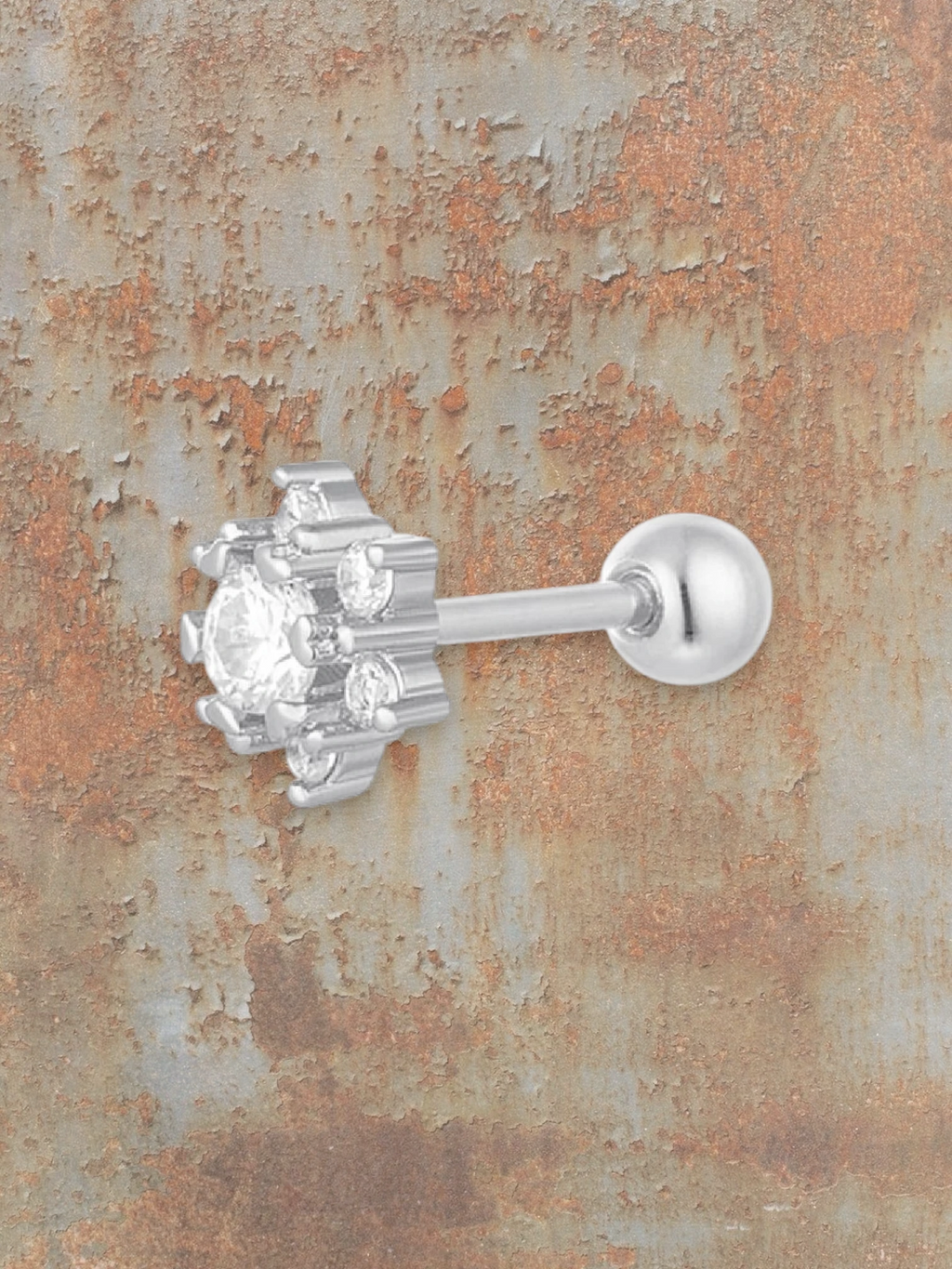 WILDSIDE silver piercing with clear sparkling stones, featuring a central gem and smaller surrounding stones.