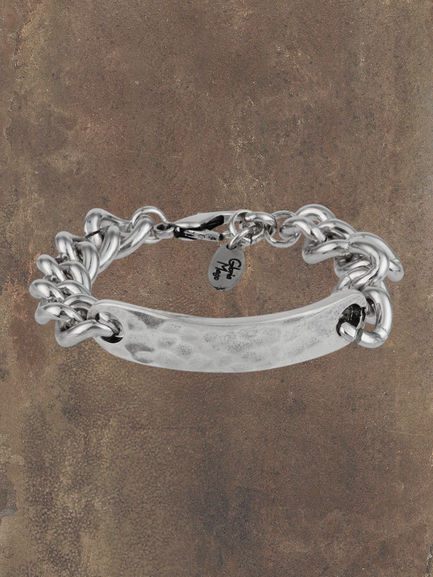 WILDSIDE silver plated aluminum chain bracelet with zamak centerpiece, lobster clasp, and adjustable length.