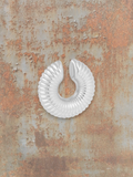 WILDSIDE silver ribbed ear cuff, a statement accessory that requires no piercing. Timeless design for any occasion.