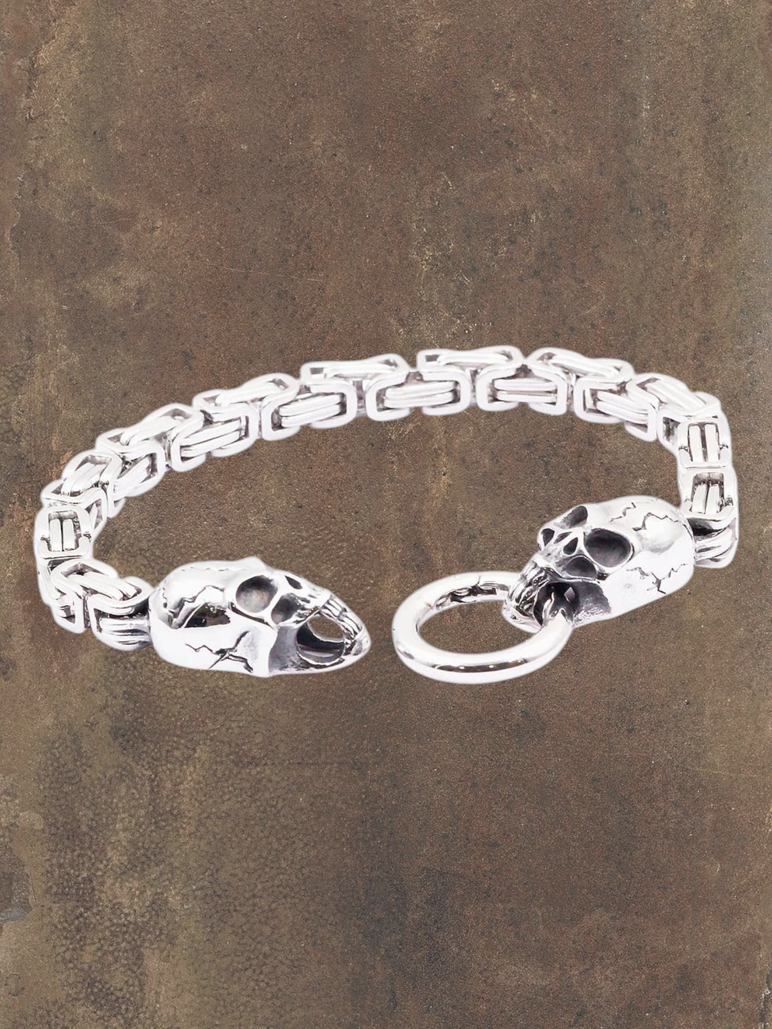 WILDSIDE silver stainless steel skull chain bracelet with toggle clasp. Edgy, durable, and stylish.
