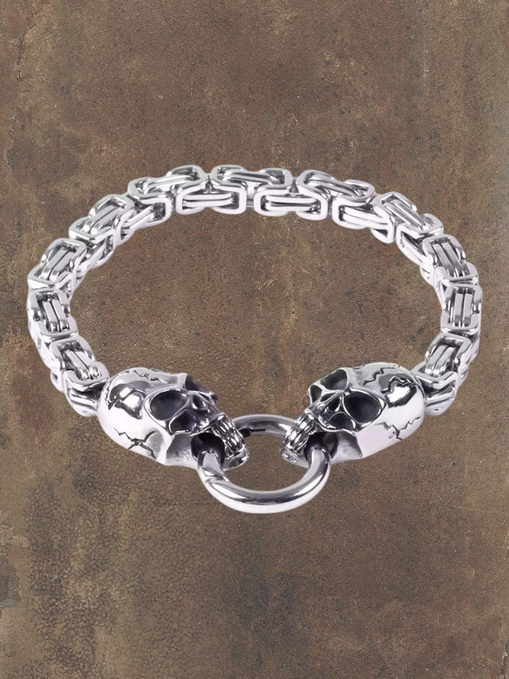 WILDSIDE silver stainless steel skull chain bracelet with toggle clasp. Edgy, durable, and stylish.