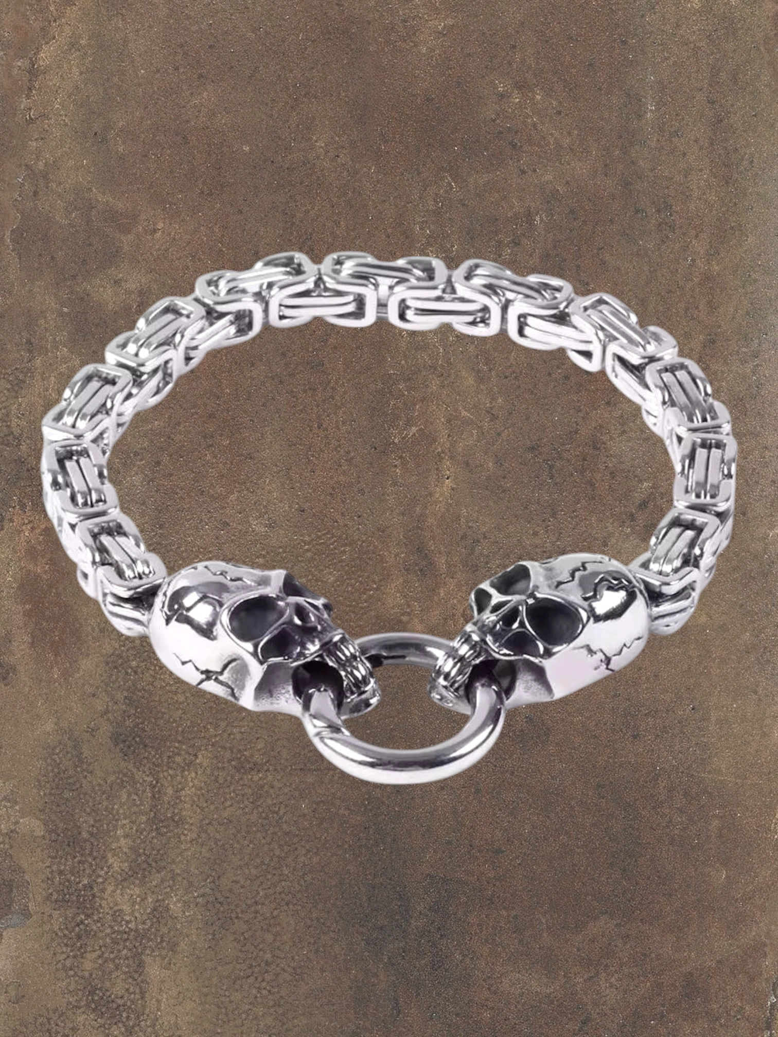 WILDSIDE silver stainless steel skull chain bracelet with toggle clasp. Edgy, durable, and stylish.