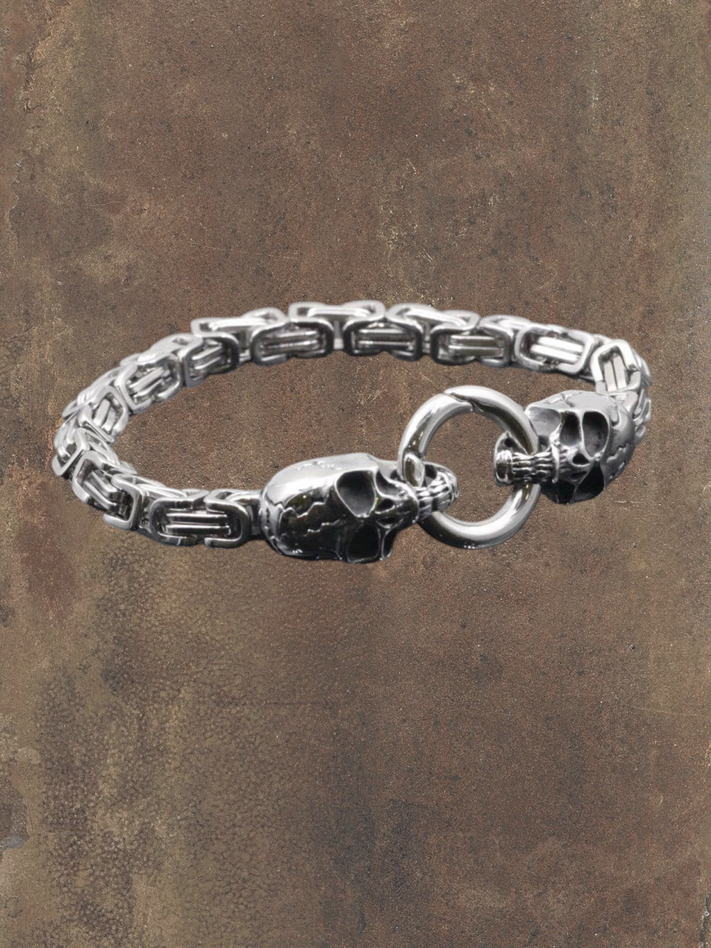 WILDSIDE silver stainless steel skull chain bracelet with toggle clasp. Edgy and durable.